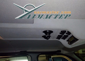 Вырез под плафоны верхнего штатного света ПАТРИОТ, место для установки р/станции и место для бумаг. 